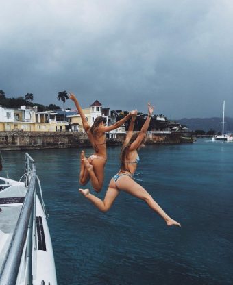 random bkini girls jumping to the sea
