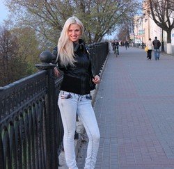 Beautiful woman from Eastern Europe with slender hot body in jeans
